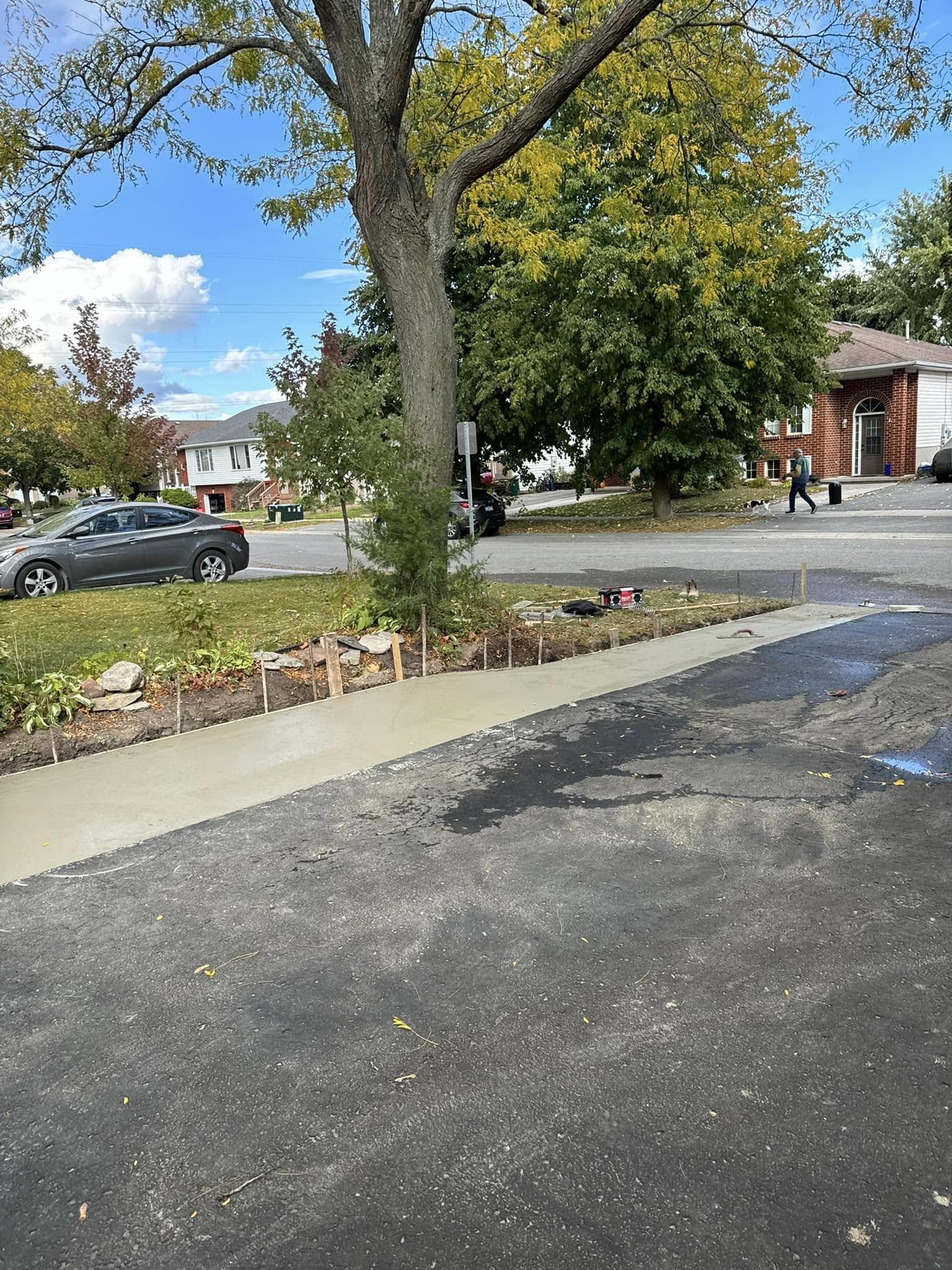 Curb, walkway and steps installed for new driveway, just waiting on fresh asphalt ! 1